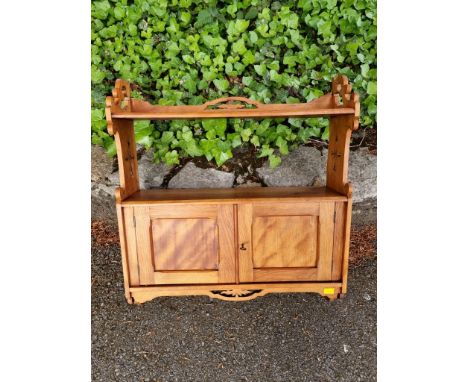 An old hanging wall shelf,&nbsp;having pair of cupboard doors, 65cm high x 58cm wide.&nbsp; 