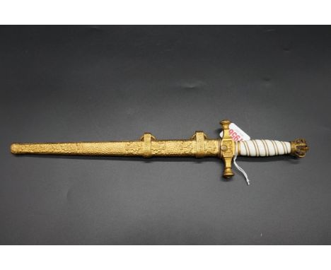 A Russian or Greek dagger and gilt scabbard.&nbsp;