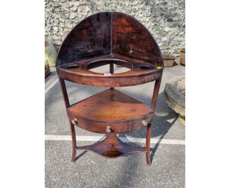 An antique mahogany corner washstand, together&nbsp;with a gilt oval mirror; a stick stand; and another gilt frame. (4)
