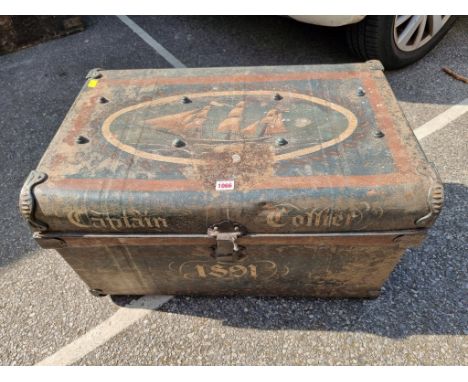 An old painted metal trunk,&nbsp;69cm wide.&nbsp; 