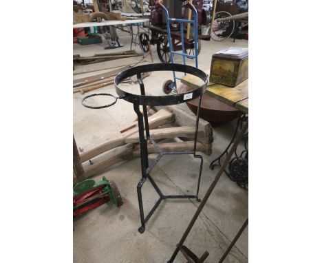A vintage wrought metal wash basin stand 
