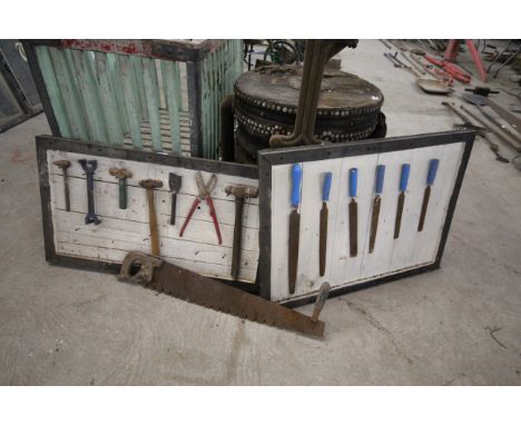 Seven various tools mounted on a display board, six various length files mounted on a display board and a vintage saw