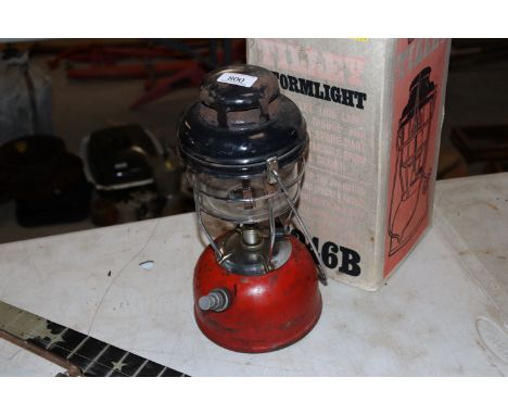 A Tilley lamp in original box 