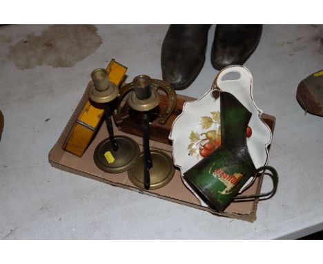 A vintage Castrol fuel can, a wet stone, a pair of brass candlesticks, a brass door knocker and a vintage cigarette tin