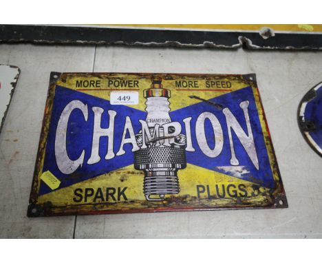 An enamel advertising sign for "Champion Spark Plugs", approx. 8" x 12"
