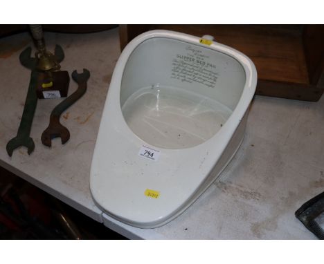 A vintage slipper bedpan