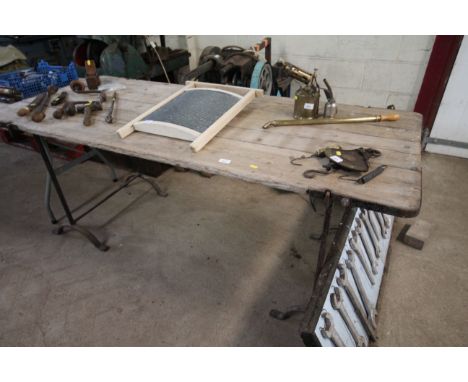 A vintage pine and iron trestle table, approx. 30" x 71&frac12;"