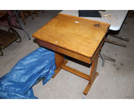 A vintage oak school desk