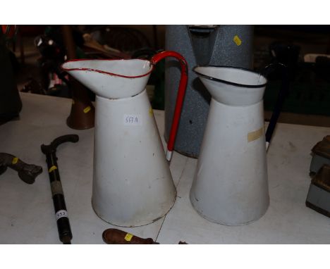 Two large enamel jugs 