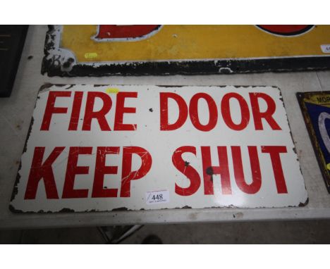 An enamel warning sign "Fire Door Keep Shut", approx. 9½" x 19" 