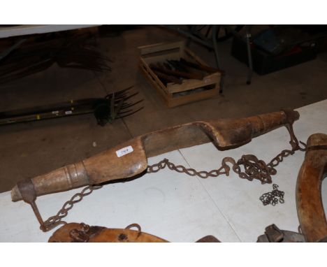 A vintage yoke complete with iron chains 