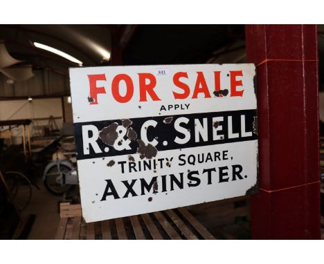 A double sided enamel Estate Agents For Sale sign for R & C Snell Trinity Square Axminster