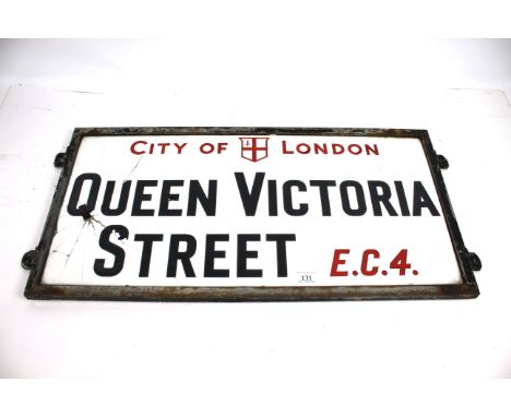 A Queen Victoria Street EC4 vitreous white glass road sign, first introduced to the City of London Square Mile in the 1920's 