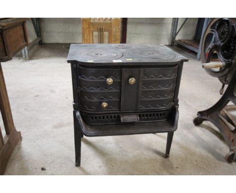 A vintage cast iron cooking range