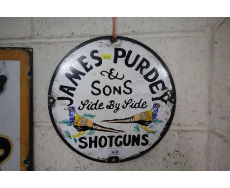 A circular enamel sign "James Purdey &amp; Sons", approx. 12" dia.