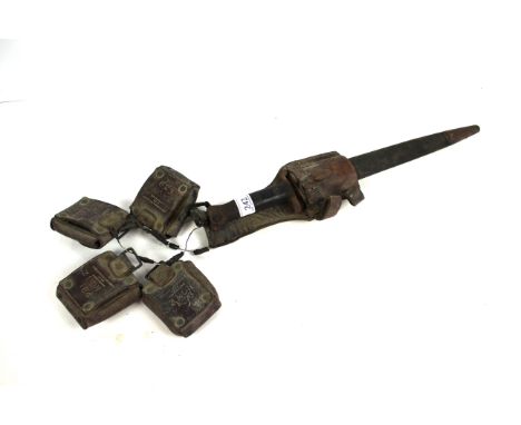 A WWI bayonet and scabbard and a munitions belt by Middlemore and Lamplaugh Ltd.