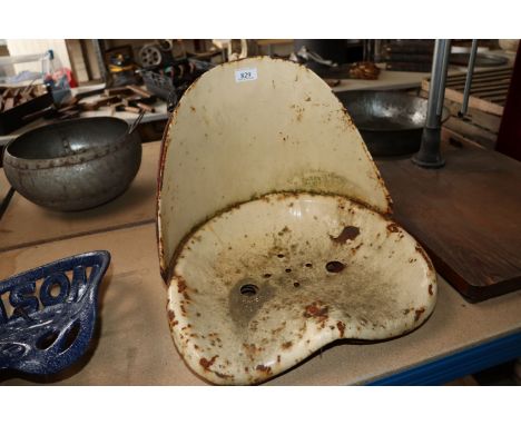 Five metal tractor seats 