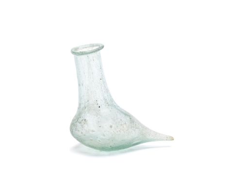  A Roman pale blue glass lamp-filler Circa 1st-2nd Century A.D.The bird-shaped flask, pulled out on one side to form a taperi