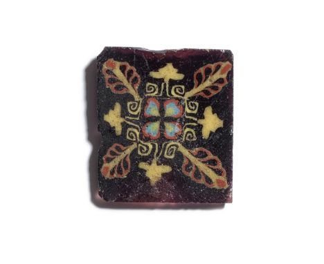  A Roman mosaic glass inlay Circa late 1st Century B.C. - 1st Century A.D.With a lily and palmette motif, a four-petalled ros