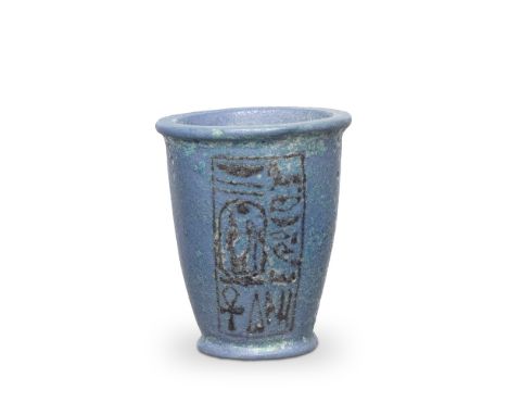 An Egyptian blue frit inscribed cup Reign of Ramesses II, 19th Dynasty, circa 1279-1213 B.C.The ritual libation cup with sid