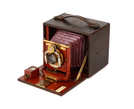 A Rochester Optical Co. Premo A 3¼×4¼" Camera, 1896-1902, serial no. 47311, with Baush & Lomb brass lens, body, G-VG, lens, V