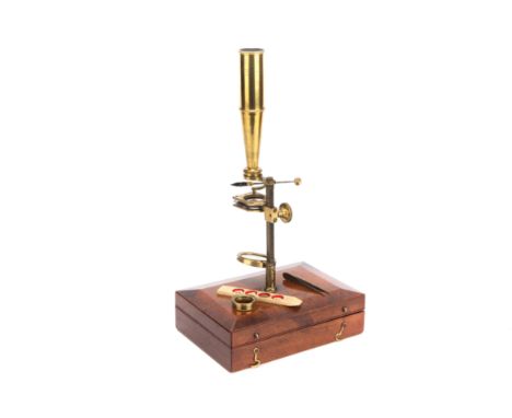 A Gould Microscope, c.1840, English, signed 'Carpenter 24 Regent St, London', screws into brass boss on case lid, with concav