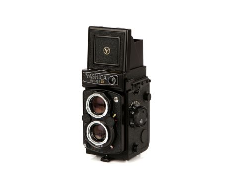 A Yashica Mat-124G TLR Camera, black, serial no. 7097517, with Yashinon f/3.5 80mm lens, body, E, shutter working, lens, VG, 