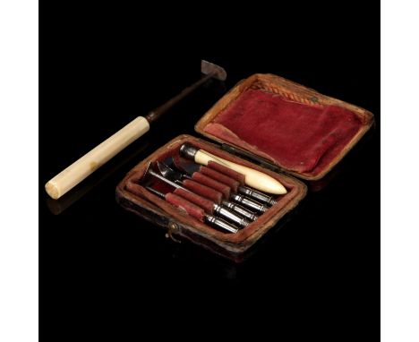 A Set of Georgian Dental Scalers with Mirror, together with another scaler, set of five instruments in velvet lined morocco l