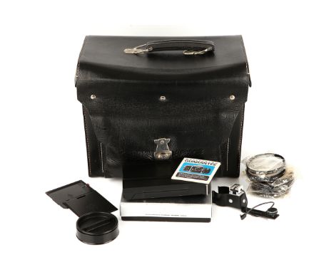 A Hasselblad Reporter Outfit Case, black, complete with various Hasselblad accessories including filters, instructions, Polar