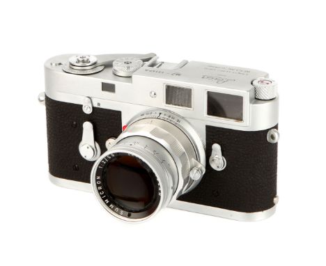 A Leica M2 Attrappe Rangefinder Camera, 1957-67, chrome, serial no. 13140A, with Leitz Summicron f/2 50mm lens, body, G-VG, s