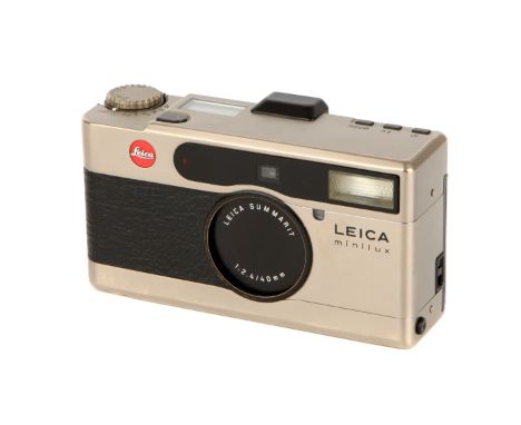 A Leica Minilux Compact Camera, titanium, serial no. 2129894, with Leitz Summarit f/2.4 40mm lens, body, F, shutter working, 