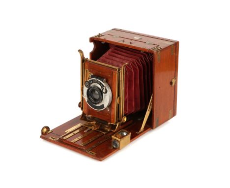 A J. Lizars 'Challenge' Half Plate Tropical Hand & Stand Camera, 1904, brass bound teak, serial no. 4931, with W. Kenngott Me