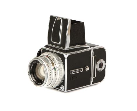 A Hasselblad 500C Medium Format Camera, 1968, chrome, serial no. TR82401, with Carl Zeiss Planar f/2.8 80mm lens, chrome, ser