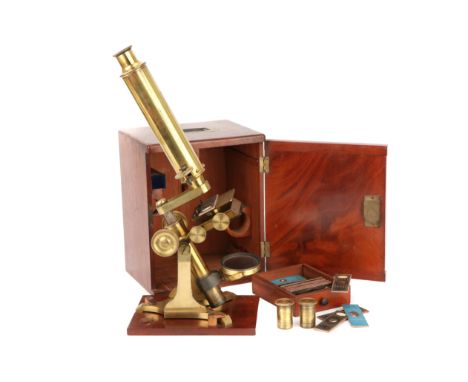 A Victorian Society of The Arts Type Microscope, c.1860, English, engraved 'Dollond LONDON', standing on Y-shaped base, plano