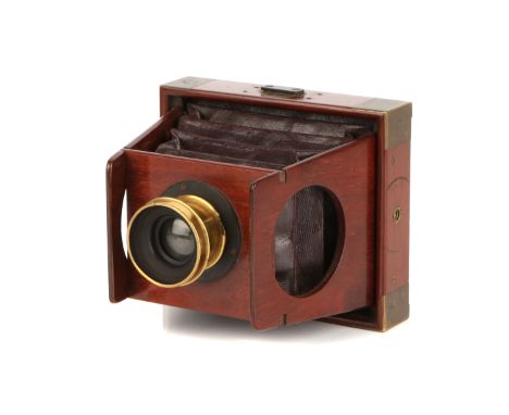 A Shew & Co. Xit 3¼×4¼ Mahogany Folding Strut Camera, 1900, with unmarked f/16 rotary Waterhouse stop brass lens, body, VG, l