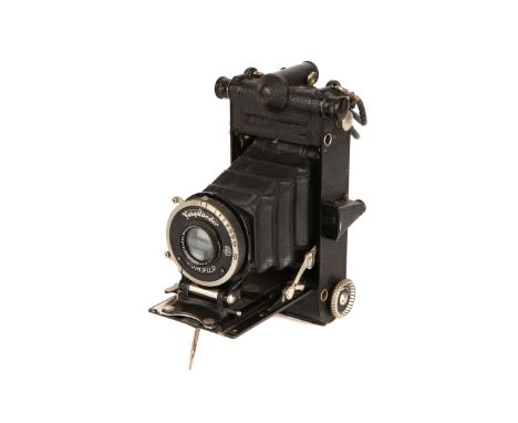 A Voigtlander Prominent 6x9 Rangefinder Camera, 1933, black, serial no. D964893, with Voigtlander Heliar f/4.5 105mm lens, se