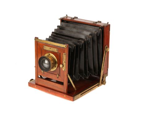 An Evans & Sons Hanover No.1 Half Plate Mahogany Field Camera, 1900, with unmarked rotary Waterhouse stop brass lens, body, G