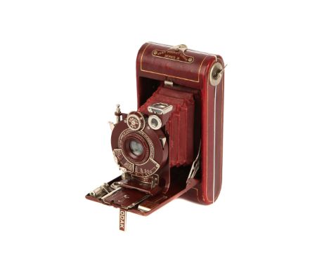 A Kodak Vanity Kodak Vest Pocket Series III Camera, 1928-33, red, with Kodak Anastigmat f/6.3 83mm lens, serial no. 43637, bo