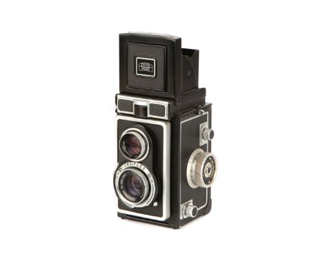 A Zeiss Ikon Ikoflex Ic (886/16) TLR Camera, 1956-60, black, serial no. 17686, body, VG-E, shutter working, lens, G-VG, some 