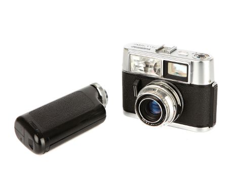 A Voigtlander Vitrona Camera, 1964, chrome, serial no. 528721, with Voigtlander Color-Lanthar f/2.8 50mm lens, body, VG, shut