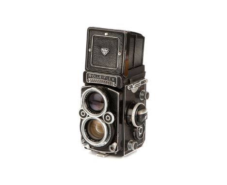 A Rollei Rolleiflex 2.8F TLR Camera, black, serial no. 2438796, with Carl Zeiss Planar f/2.8 80mm lens, serial no. 4090195, b