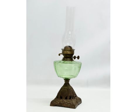A Late 19th Century Victorian double burner oil lamp, with glass bowl. 55cm 