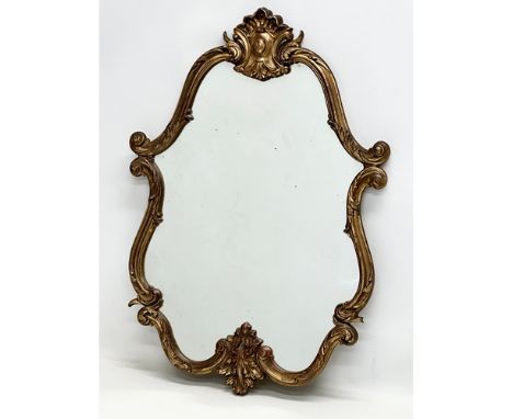 A vintage Rococo style mirror. 45x64cm 