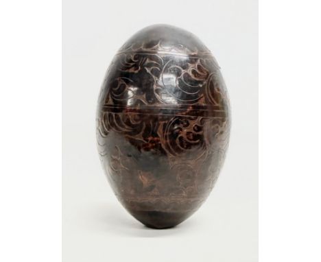 A Late 18th/Early 19th Century Bugbear coconut flask. 20cm 