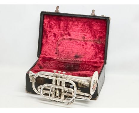 A Boosey &amp; Hawkes LTD cornet. 