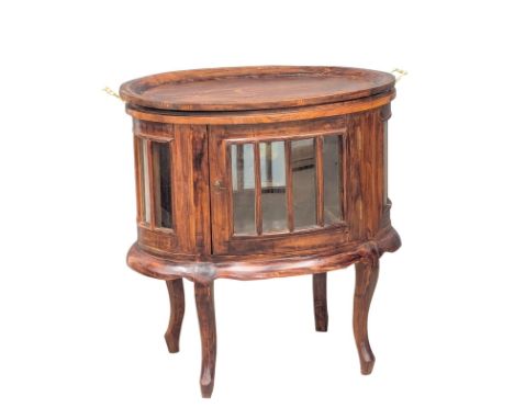 An Indonesian mahogany drinks cabinet with serving tray. 76x46x75cm. 1 