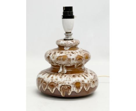 A Mid Century lava glazed table lamp. 16x24cm 
