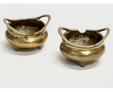 A pair of small Early 20th Century Chinese brass tripod censers. Emperor Xuande seal mark. 7x6.5x5cm. 