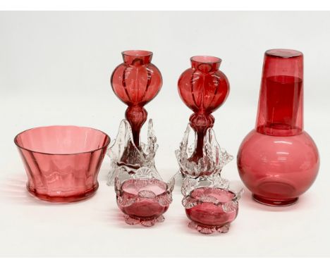 A collection of 19th Century cranberry and ruby glass. A pair of Late 19th Century Bohemian ruby glass vases by Franz Welz 19