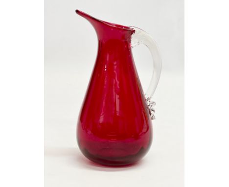 Geoffrey Baxter. A Mid 20th Century ruby glass jug designed by Geoffrey Baxter for Whitefriars. 16.5cm 